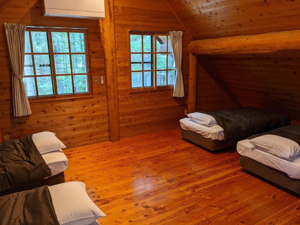 Aparthotel White Tree Log House Madarao Tangram Shinano  Esterno foto